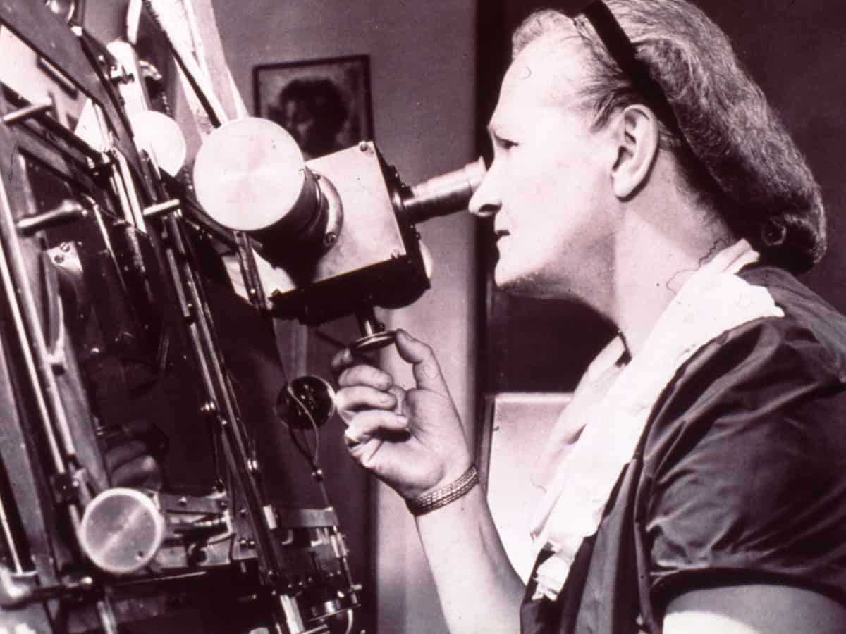astronomer Cecilia Payne Gaposchkin using a telescope