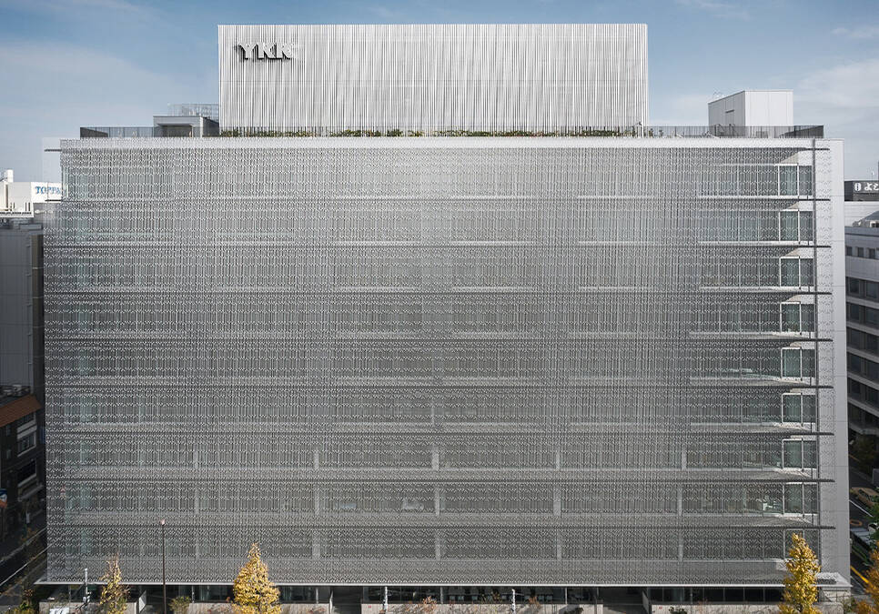 big silver colored building of YKK group